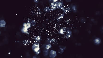 白色粒子在黑色背景上移动背景