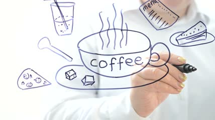 在玻璃杯中画咖啡厅的产品图特写实拍