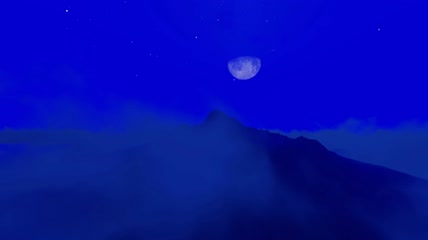 蓝夜中一座山的剪影视频