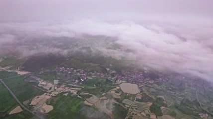 4k航拍清晨云雾下的农村素材