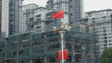 4k升格拍摄五星红旗与建筑