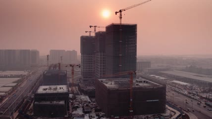 4k航拍夕阳下的建筑
