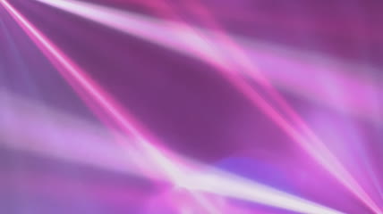 粉紫色动态炫光舞台背景素材