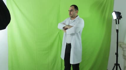 绿布前的医生抠像视频素材