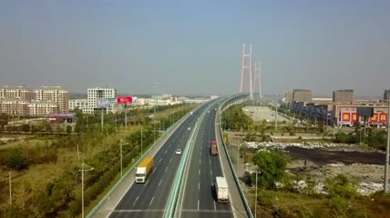 航拍高速公路跨江大桥车流视频素材