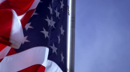 4K近距离拍摄的美国国旗在风中飘荡