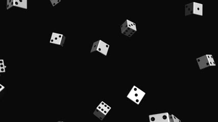 从黑色背景掉落的骰子素材